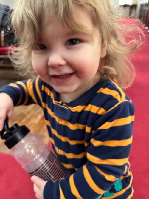 A young child enjoying time at a church gathering